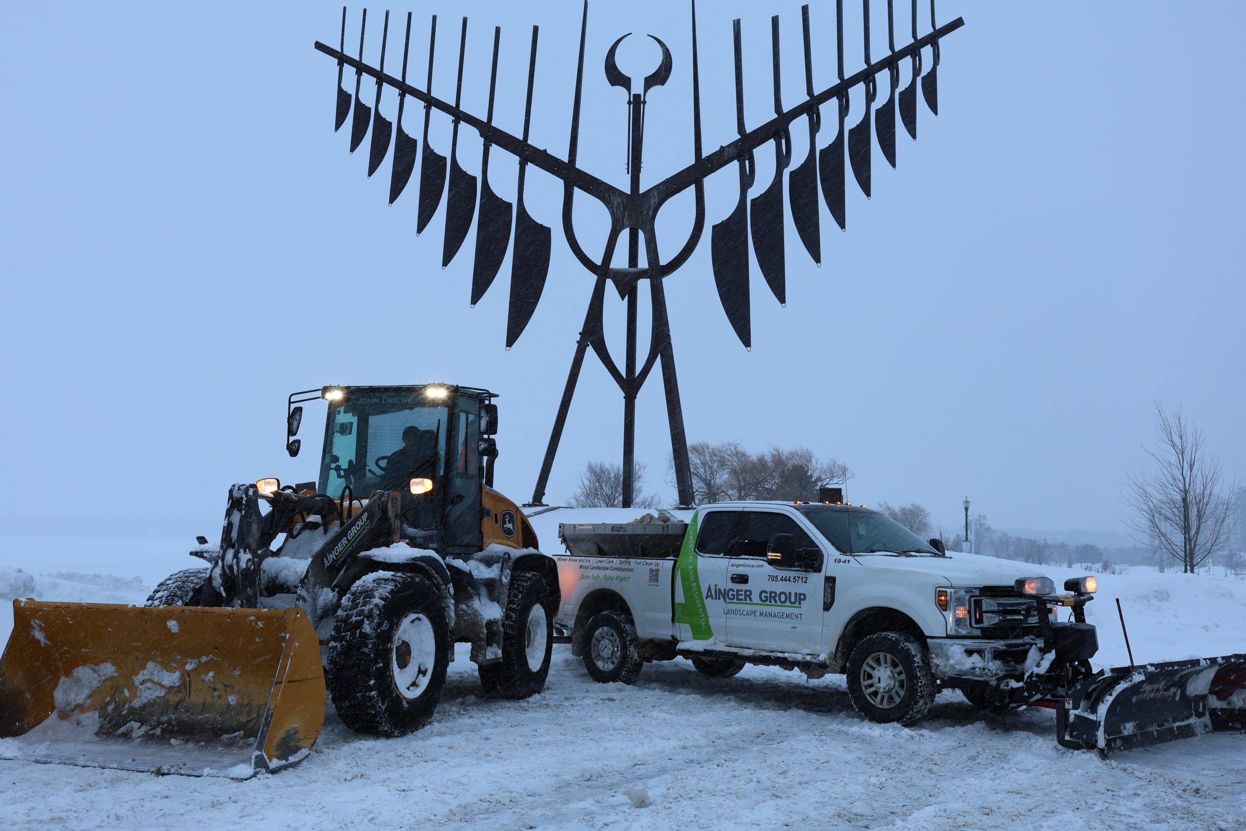 Commercial plowing service equipment preparing to clear snow in Barrie Ontario