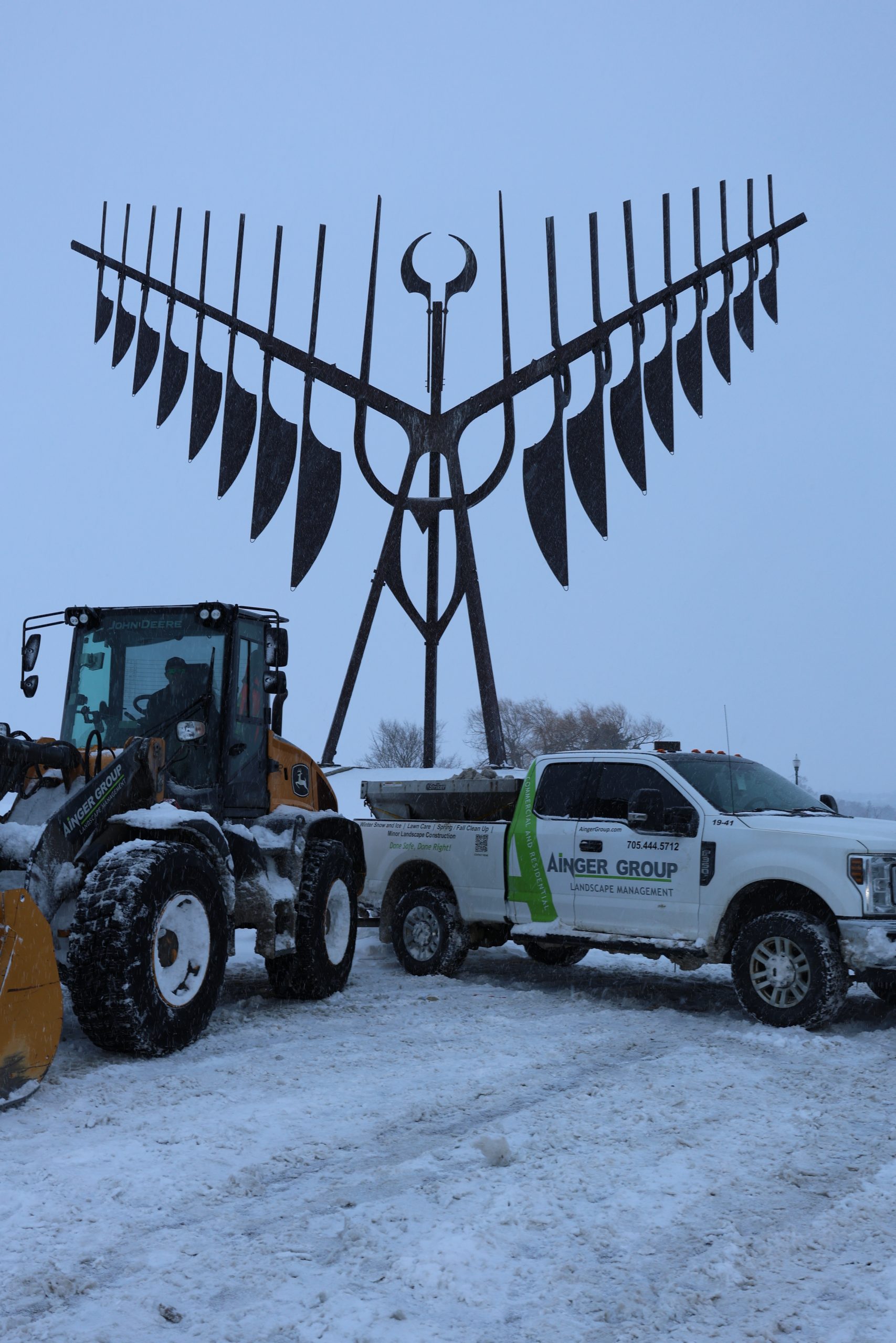 Ainger commercial snow removal equipment operating in Barrie Ontario
