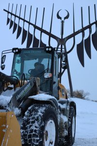 Ainger compact snow removal loader operating in Barrie Ontario