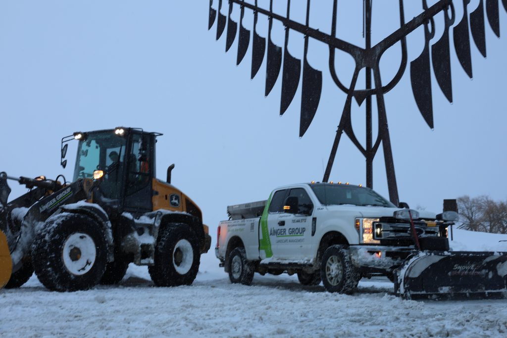 Ainger commercial snow removal equipment working in Barrie Ontario
