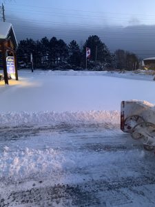 Professionally cleared driveway after snowfall in Collingwood Ontario. Driveway Plowing Rates
