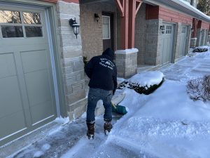 Residential snow clearing with a snow pusher in Collingwood Ontario